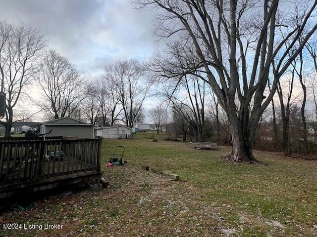 view of yard with a deck