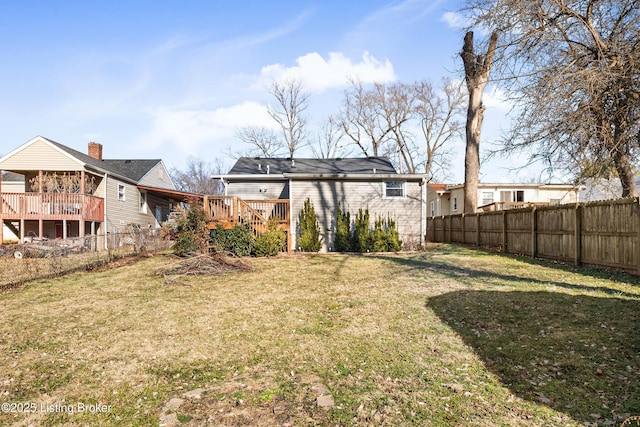 view of yard with a wooden deck