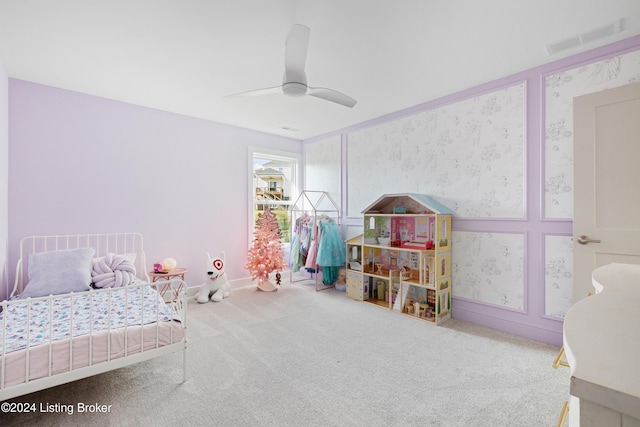 carpeted bedroom with ceiling fan