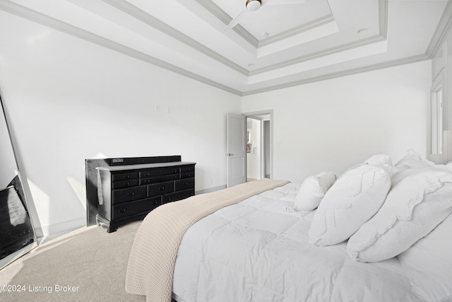 bedroom with carpet floors and crown molding