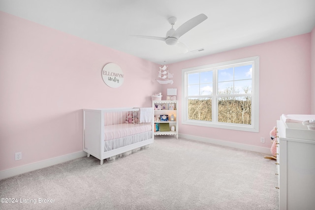 carpeted bedroom with ceiling fan