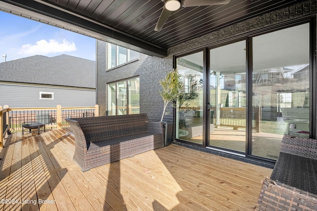 wooden terrace with ceiling fan