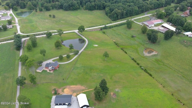 drone / aerial view with a rural view and a water view