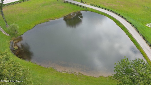 bird's eye view featuring a water view and a rural view