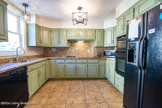 kitchen with sink, a textured ceiling, decorative light fixtures, black appliances, and green cabinetry