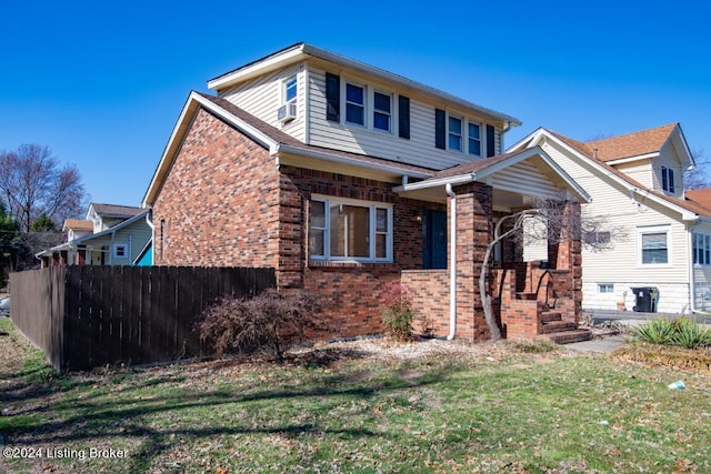 view of front of home with a front lawn