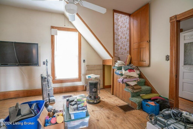 bonus room featuring ceiling fan and light hardwood / wood-style flooring