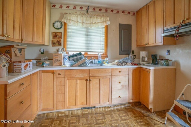 kitchen with sink and light parquet flooring