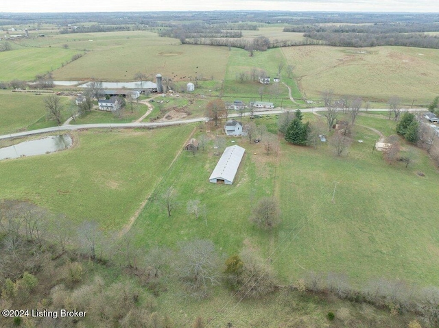 drone / aerial view with a water view and a rural view