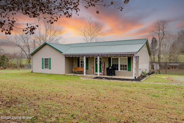 view of front facade with a lawn