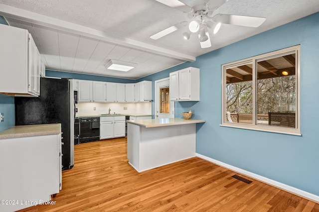 kitchen with dishwasher, light hardwood / wood-style flooring, white cabinets, and ceiling fan