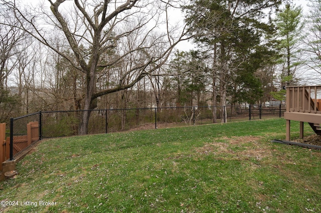 view of yard with a deck