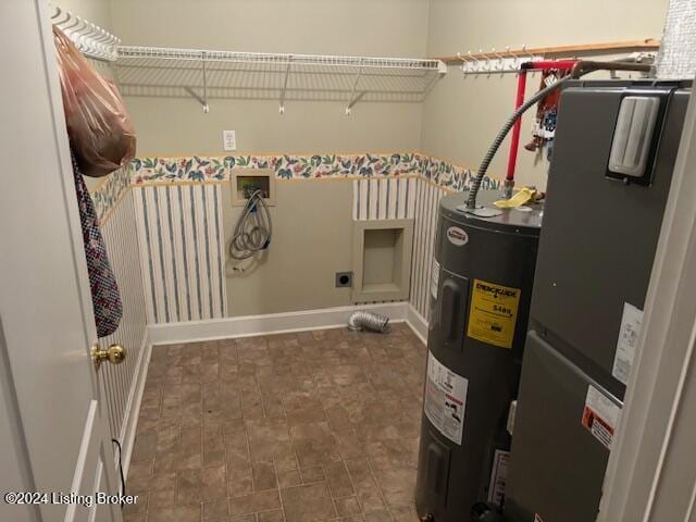 utility room featuring electric water heater