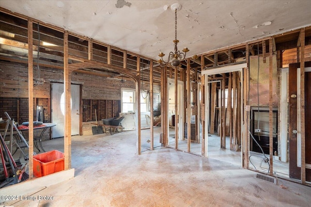 misc room featuring a notable chandelier