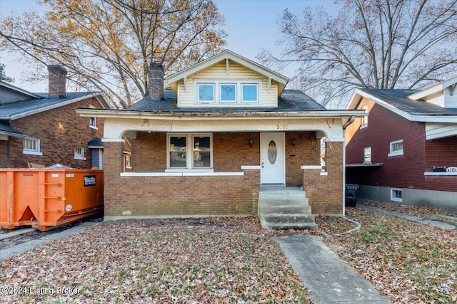 bungalow-style house featuring covered porch