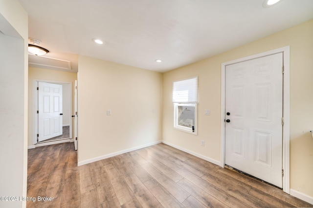 foyer entrance with hardwood / wood-style flooring