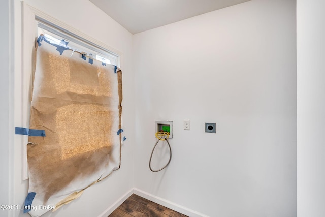 laundry area with electric dryer hookup, dark wood-type flooring, and washer hookup