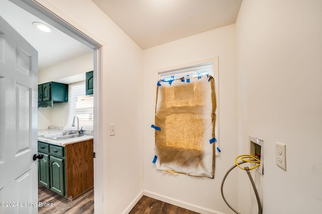 bathroom featuring sink and hardwood / wood-style floors