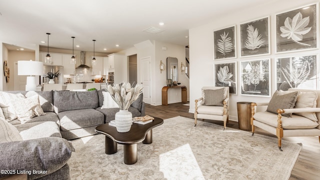 living room with light hardwood / wood-style floors