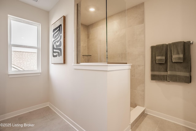 bathroom featuring a shower and tile patterned floors