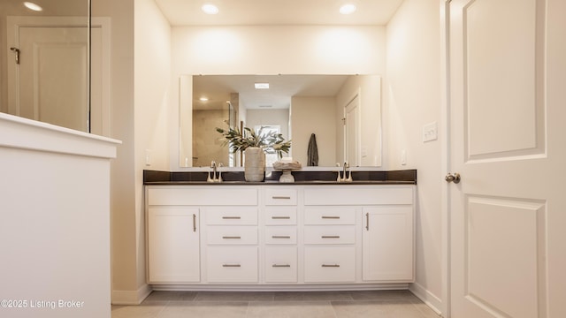 bathroom featuring vanity and tile patterned floors