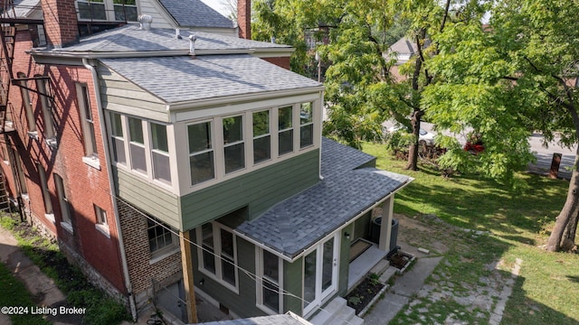 view of property exterior featuring a yard