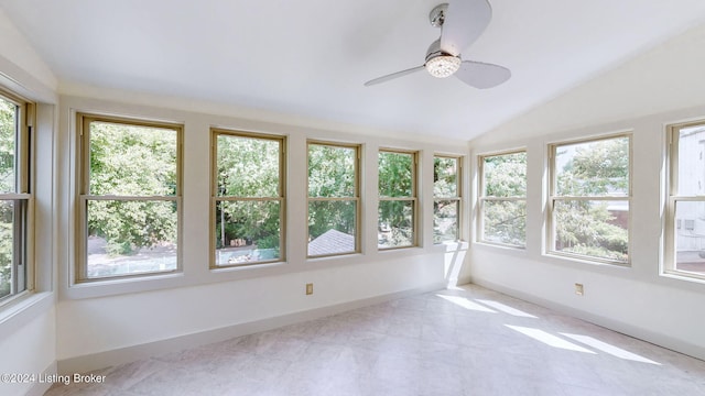 unfurnished sunroom featuring vaulted ceiling and ceiling fan