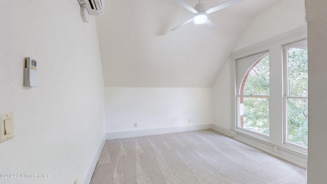 bonus room featuring light colored carpet, a wealth of natural light, lofted ceiling, and ceiling fan