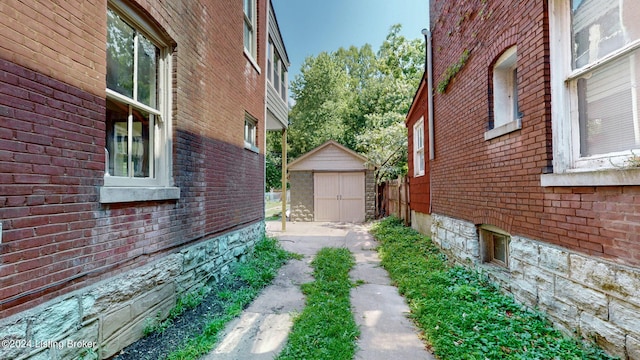 view of side of property with a storage shed