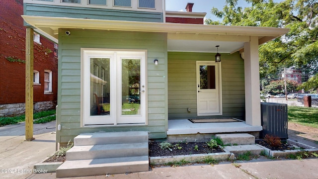 entrance to property featuring central AC unit