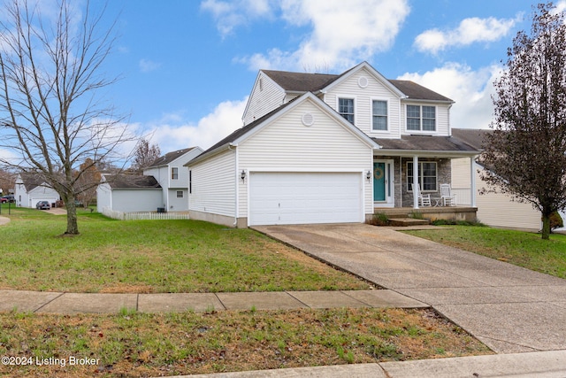 front facade featuring a porch, a garage, and a front lawn