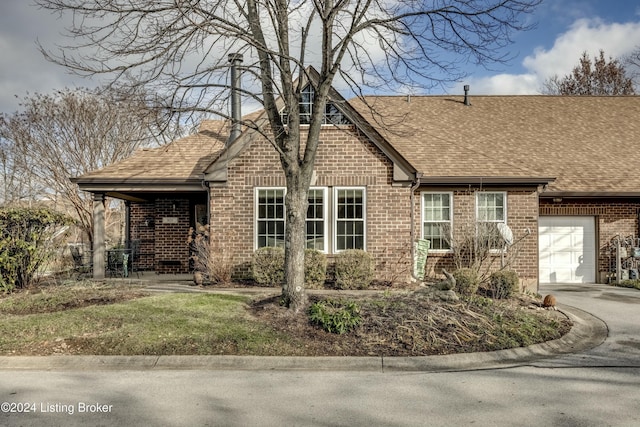 view of front of home with a garage