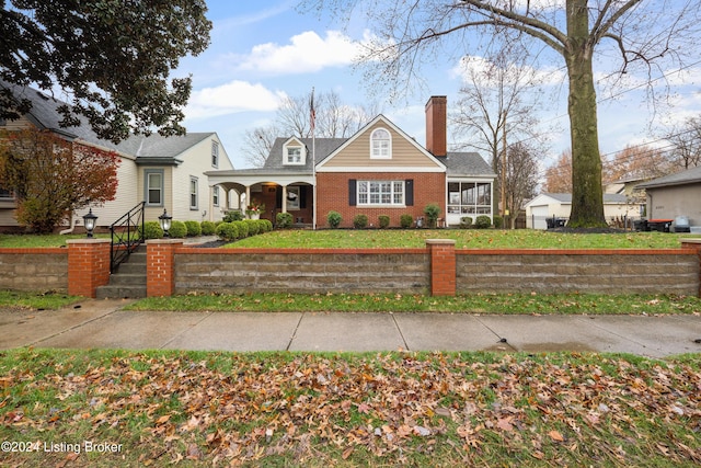 view of front facade with a sunroom