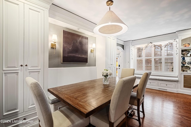 dining area featuring dark hardwood / wood-style floors