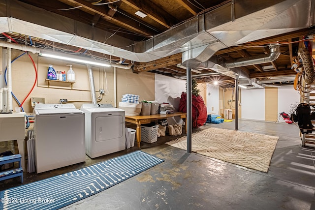 basement featuring washer and dryer