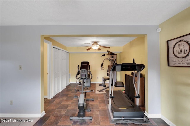 workout room with ceiling fan