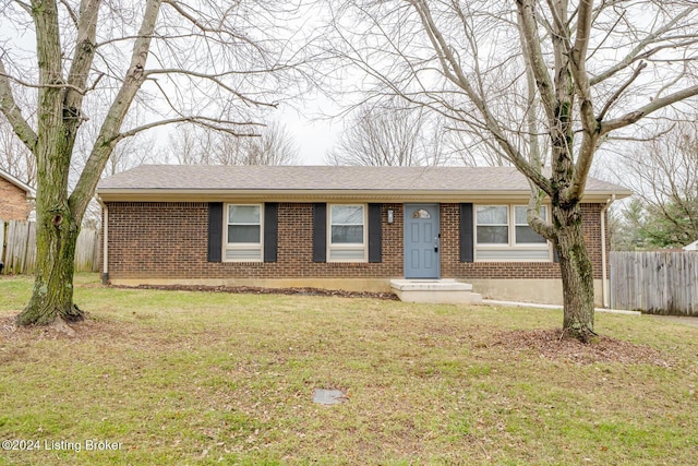 ranch-style house with a front lawn