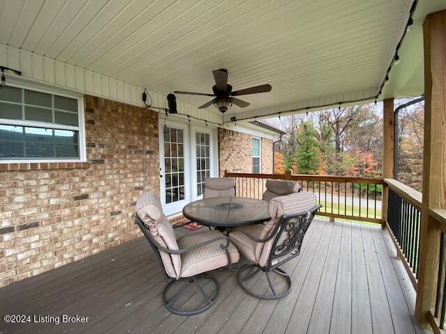 wooden terrace with ceiling fan