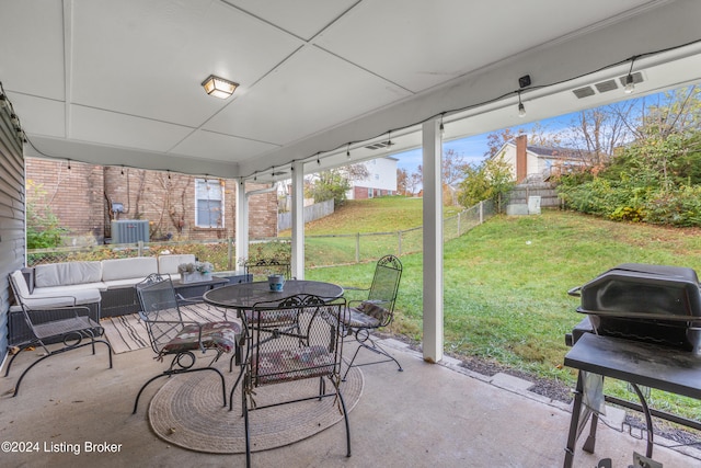 view of patio with a grill and an outdoor living space