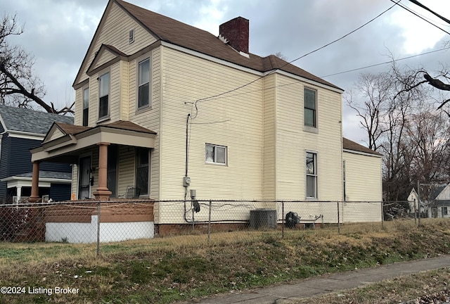 view of home's exterior with covered porch