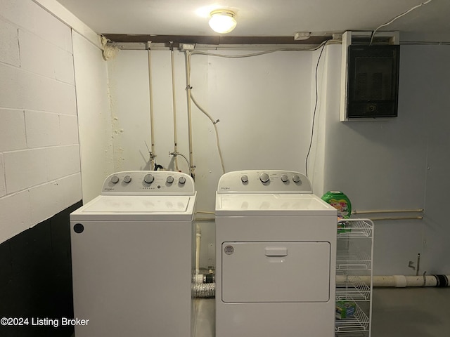 washroom featuring separate washer and dryer