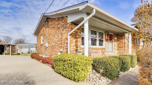 view of home's exterior featuring covered porch