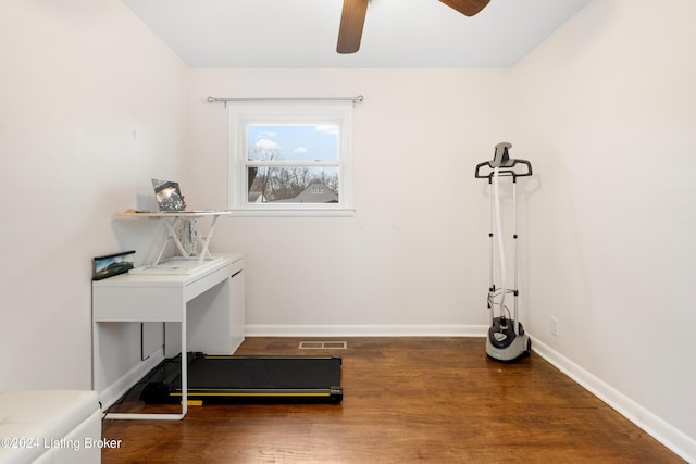 interior space with dark hardwood / wood-style floors and ceiling fan