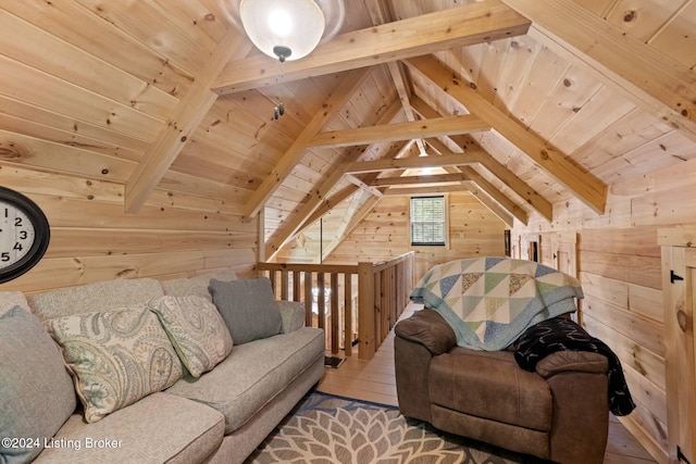 interior space with hardwood / wood-style floors, vaulted ceiling with beams, wood ceiling, and wooden walls