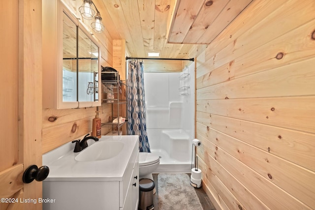 bathroom with walk in shower, wood ceiling, vanity, toilet, and wood walls