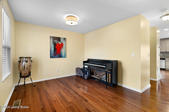 misc room with dark wood-type flooring