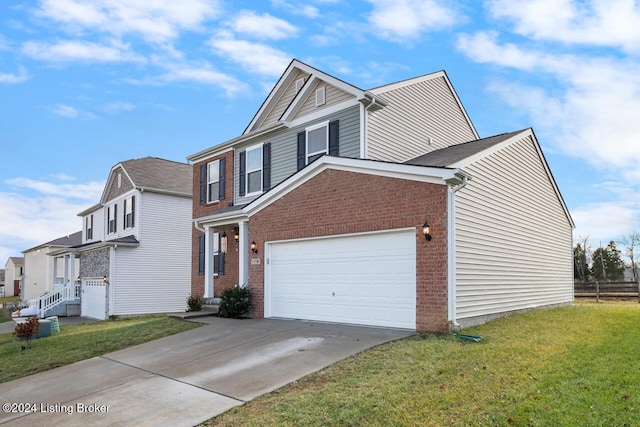 view of front of home with a garage and a front yard