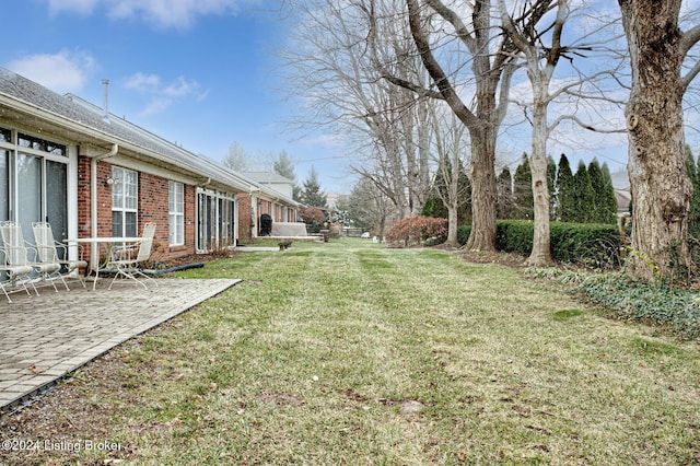 view of yard with a patio area