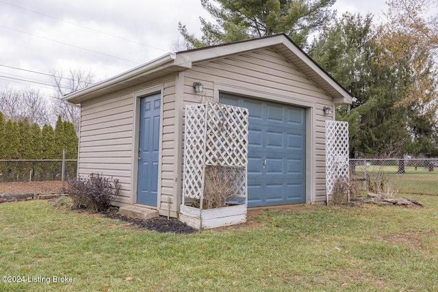 garage with a yard