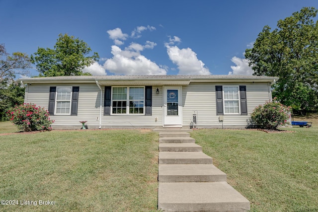 view of front of property with a front lawn